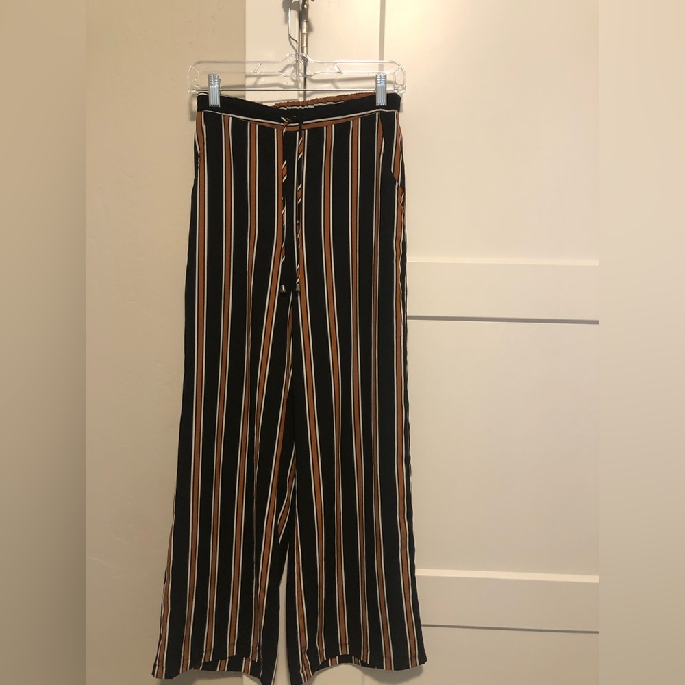Striped black orange and white dress pants